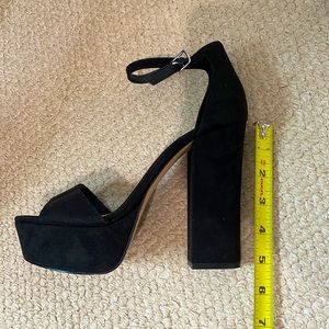 Steve Madden. Black. Platform heels. Open toe. Size 7 women’s.